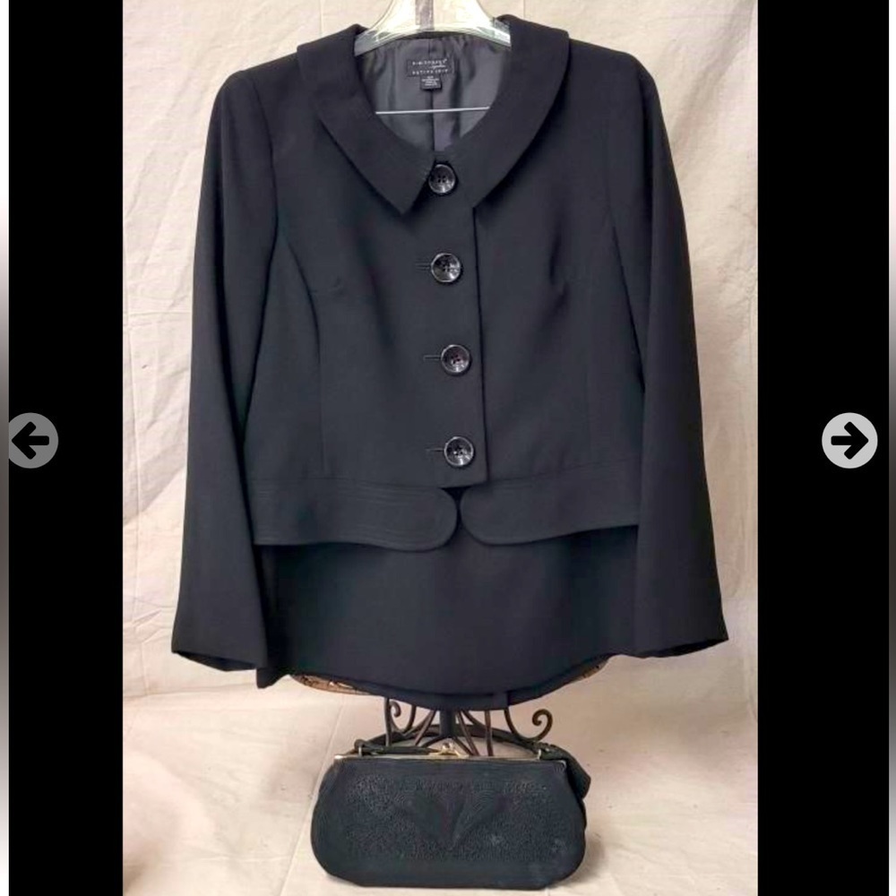 Kim Rogers suit and purse 10